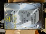 an image of a hard drive sitting on top of a cardboard box