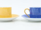 two cups that are next to each other on the table