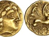a gold coin with an image of a woman and a horse