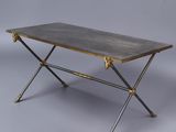 a black and gold coffee table with a metal frame and legs