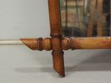 a wooden table with a mirror on top of it