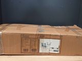 a cardboard box sitting on top of a wooden table