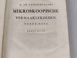 an open book with a black and white title on it