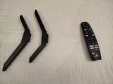 two remote controls that are sitting next to each other