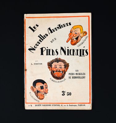 un vieux livre sur lequel figurent plein de visages de dessins animés