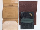 three different types of leather wallets on a white surface