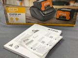 a black and decker battery charger with instructions on a table