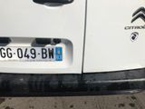 a close up of a car with a license plate on it
