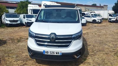 a white van that is parked in a lot