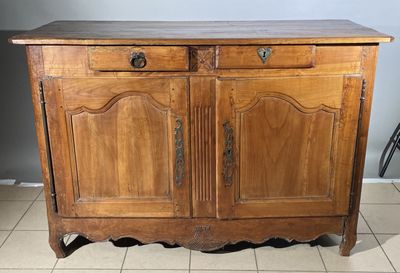 a wooden cabinet with two doors and two drawers