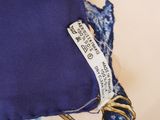 a close up of a piece of fabric with a tag on it