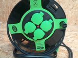 a green and black hose with a green flower on it