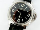 a close up of a wrist watch on a white surface