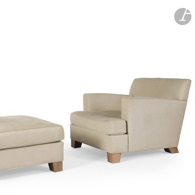 two chairs and a foot stool sitting next to each other on a white surface