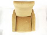 an upholstered chair with a tan upholstered seat and a tan upholstered back