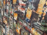 a painting of a cityscape on the wall of a bathroom
