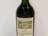 a bottle of wine that is sitting on a table