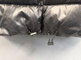 a close up of the zippers on a black puffer jacket