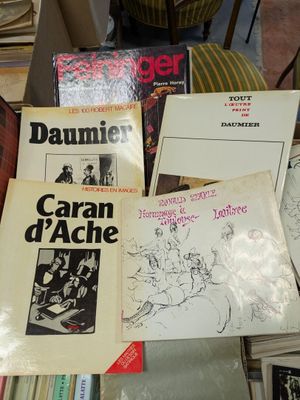 a lot of books that are on a table
