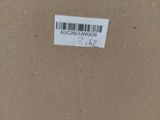 a close up of a cardboard box with a barcode on it
