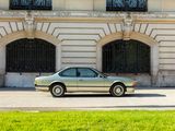 a car parked in front of a building on the side of the road