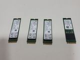 a close up of three different types of ram cards on a table