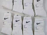 six paires de chaussettes blanches ornées du logo Nike noir