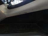 a close up of a car dashboard with a steering wheel