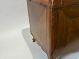 a small wooden box sitting on top of a table
