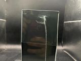 someone is taking a picture of a cell phone in a display case