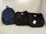 three backpacks sitting on a shelf in a room