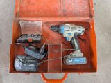 a tool box with tools in it sitting on the floor