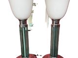 two lamps that are sitting on top of each other