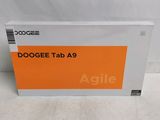 the box of the dogee tab a9 tablet is sitting on a white surface