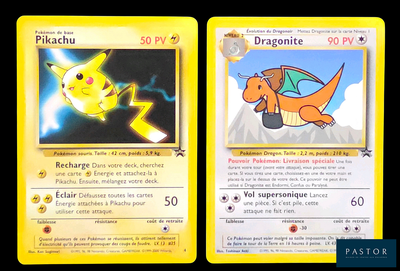 deux cartes Pokémon représentant un dragon jaune et un dragon jaune