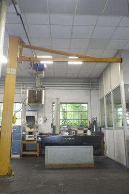 a picture of a large room with a crane in it