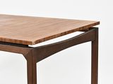 a close up of a table with a wooden top on a white background