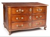 a wooden chest of drawers with many drawers on it