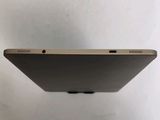 the back of a laptop with a small screen on top of it