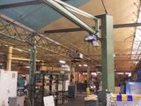 a large warehouse with a lot of machines in it