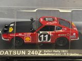a red car in a clear case with a number 11 on it