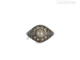 an image of a pearl and diamond ring on a white background