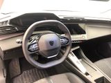 a picture of a car dashboard with a steering wheel
