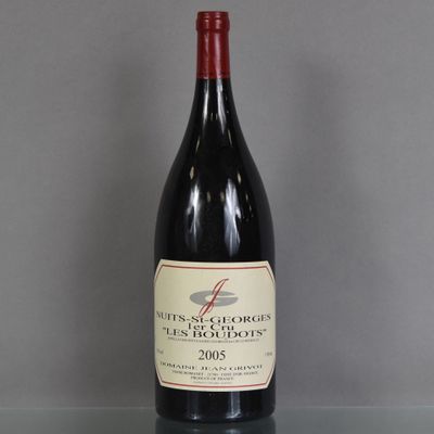 a bottle of wine that is sitting on a table