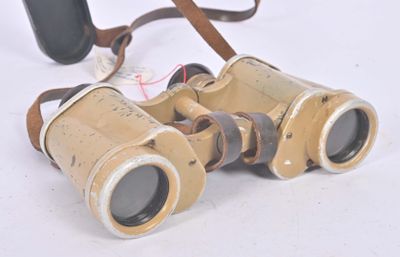 a pair of binoculars that are sitting on a table