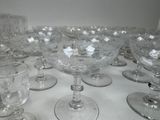 a lot of empty wine glasses on the table