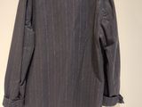 an image of a jacket hanging on a wall