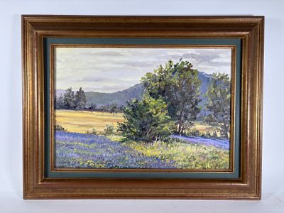 tableau représentant un champ de bluebonnets et un arbre solitaire, dans un cadre doré