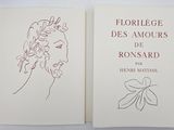 two books with drawings of a woman ' s face and a man ' s face on them