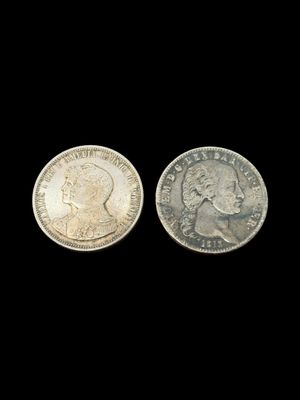 deux pièces d'argent, dont l'une représente le visage d'un homme et l'autre la tête d'une femme